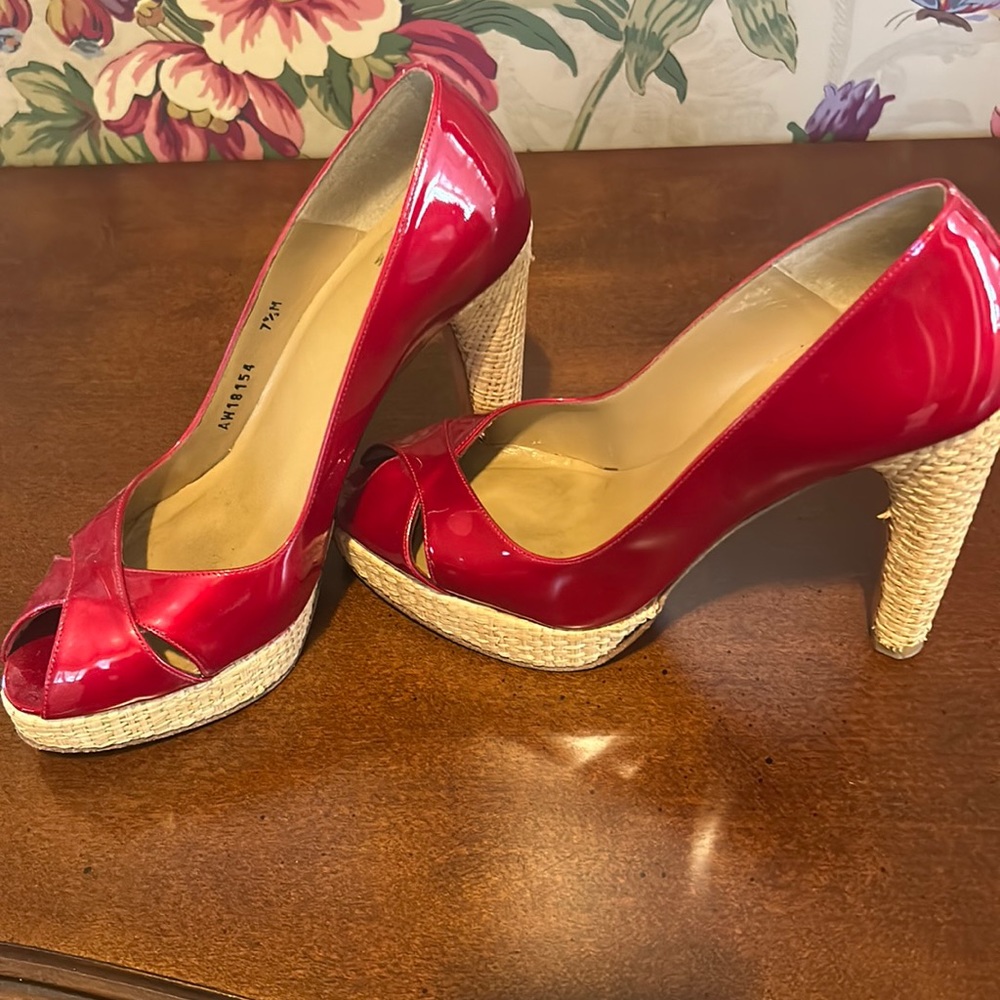 Stuart Weizmann heels. Candy apple red patent leather with rattan heel.